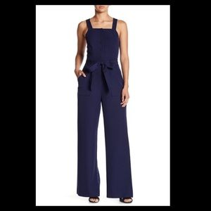 Navy Blue Cross Back Jumpsuit with pockets.